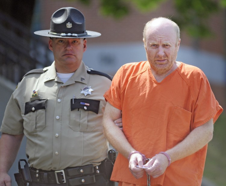 Roland Cummings of Waterville appeared in Kennebec County Superior Court on a charge of murdering Aurele Fecteau on June 9, 2014.