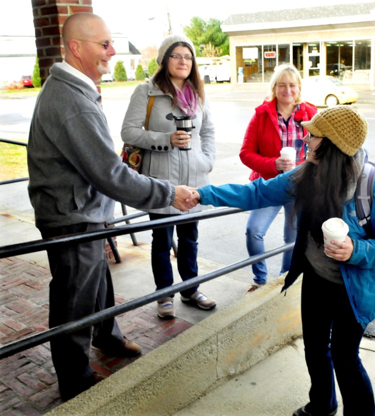 City Council candidates Stephen Soule, Jacqueline Dupont and Karen Rancourt-Thomas greet voters on Tuesday, November 3, 2015. Soule and Dupont each won their races.