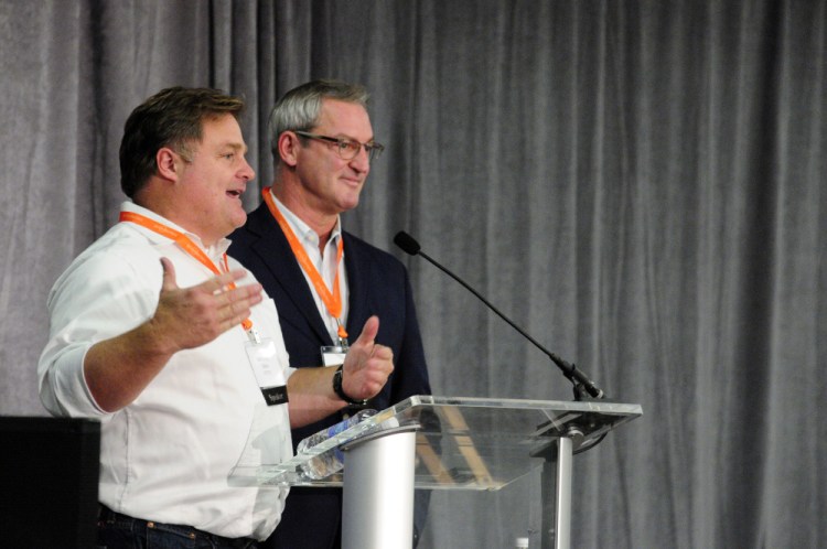 OTTO Pizza co-founders Anthony Allen, left, and Mike Keon give keynote address on Tuesday during the Mainebiz Momentum Convention at Augusta Civic Center.