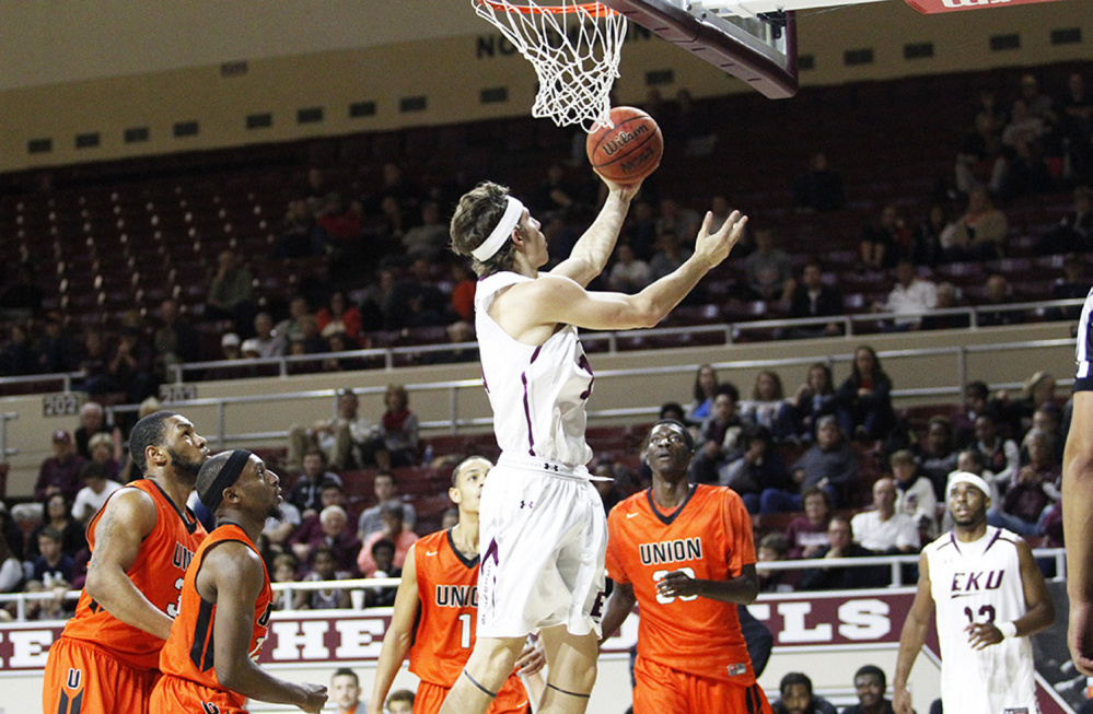 Eastern Kentucky freshman Nick Mayo goes up for a layup during an exhibition game against Union College  (Kentucky) on Sunday. Mayo, a former Messalonskee standout, scored 17 points in the victory.