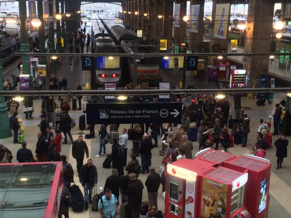 The Gare du Nord station is crowded Saturday as people attempt to board their trains out of Paris.