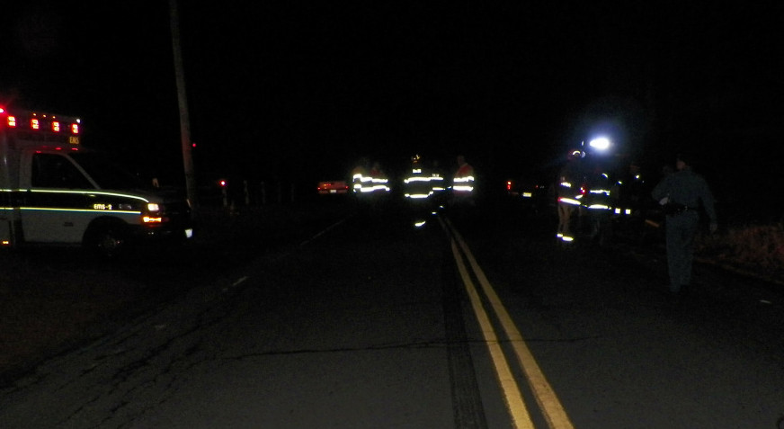 Emergency responders converge on the scene on Ferry Street in Solon Friday night, where Joshua Sincyr of Norridgewock was killed when he was hit by a pickup truck driven by Seth Burns of Embden.