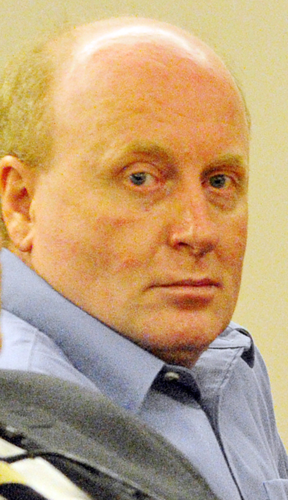 Roland L. Cummings, accused of murdering 92-year-old Aurele Fecteau in May 2014 in Fecteau’s Waterville home, sits in the Capital Judicial Center last week.