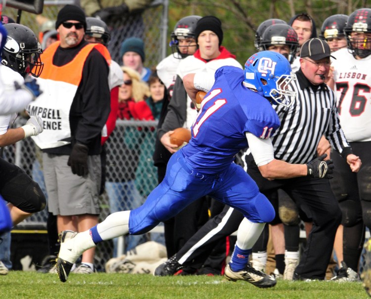 Oak Hill’s Jonah Martin runs the ball during the Class D South title game against Lisbon on Saturday in Wales.