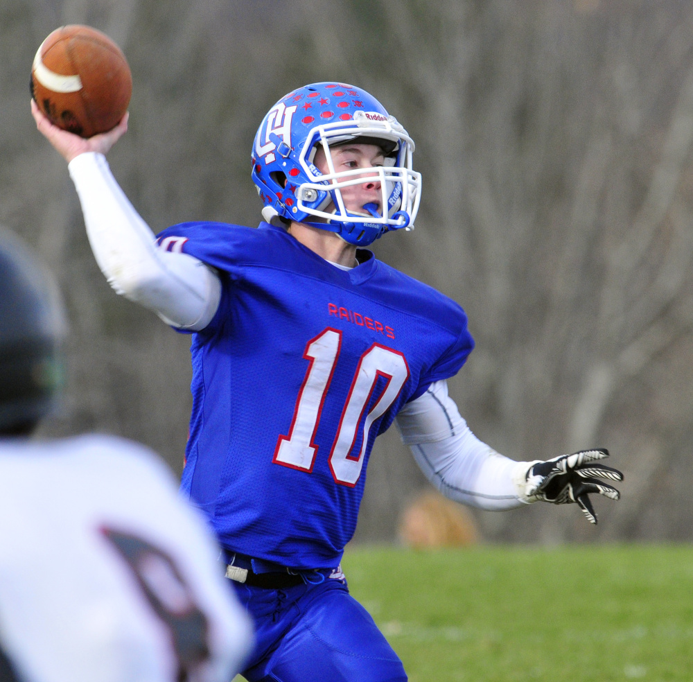 Oak Hill quarterback Dalton Therrien throws a pass during the Class D South title game against Lisbon on Saturday in Wales.