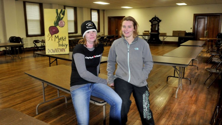 Farmers Heather Davis, left, of Cayford Orchards and Sarah Smith of Grassland farm will be among area farmers participating in selling products at the farmers market now inside the Skowhegan Masonic Hall.