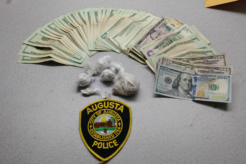 Augusta police released this photo of money and heroin that authorities say they found after searching a Ridge Road home on Monday.