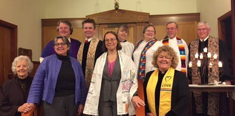 Front, from left, are Lorna Doone, Penthea Burns, Rabbi Erica Asch and the Rev. Carie Johnsen. Back, from left, are Maggie Edmondson, the Rev. Al Boyce, Jenifer Lewis, the Rev. Jane MacIntyre, the Rev. Frank Morin and the Rev. Scott Dow.