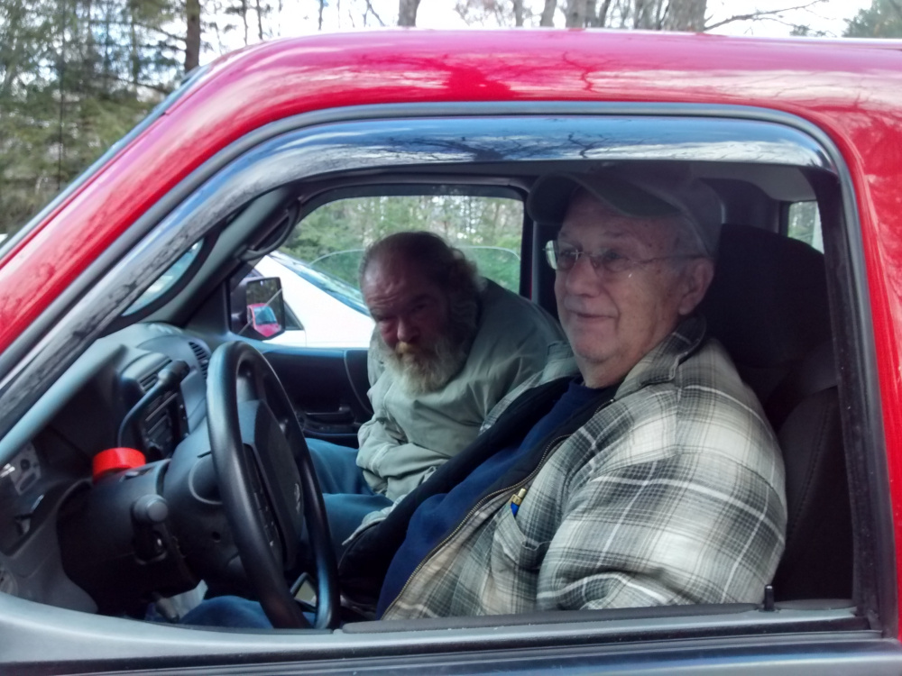 Bill Latham gives a neighbor a ride on Nov. 14, the first trip of the Neighbors Driving Neighbors program which recently began operations in the towns of Belgrade, Fayette, Mount Vernon, Rome and Vienna.