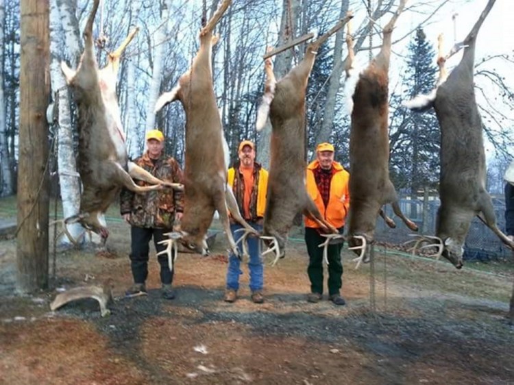 Hunters at 15 Mile Stream Lodge in The Forks the week before last bagged six deer weighing more than 200 pounds in three days. Shown with some of them are, from left, Paul McDonald of Tewksbury, Massachusetts.; Shane Crommett, owner of 15 Mile Stream Lodge; and Robert Ward of Andover, Massachusetts. Local business owners who cater to deer hunters say this year’s good season has helped boost the economy of northern Somerset County.