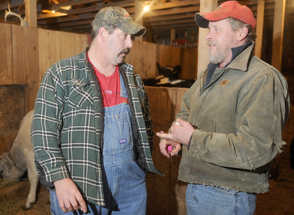 Troy Chase, right, and Peter Poland discuss the accident they were involved in in New Jersey on Sunday that claimed the lives of three people. The men spoke at Chase’s farm in Pittston Monday.