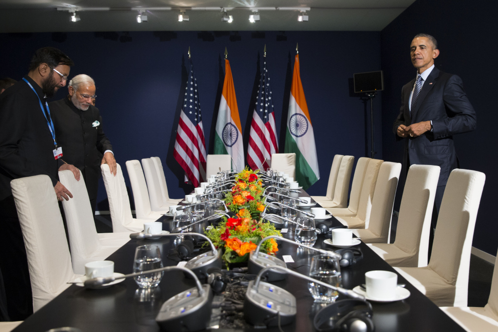 U.S. President Barack Obama, right, meets with Indian Prime Minister Narendra Modi, second left, during the COP21, United Nations Climate Change Conference, in Le Bourget, outside Paris, on Monday.