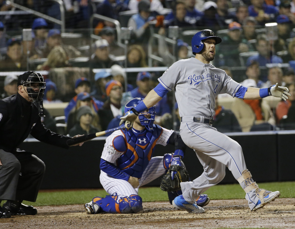 Alex Gordon of the Royals hits an RBI single in the fifth inning Saturday night during Game 4 of the World Series against the New York Mets. Kansas City capitalized on an error in the eighth inning to erase a 3-2 deficit, and now can clinch its first World Series title since 1985 with a victory Sunday night.