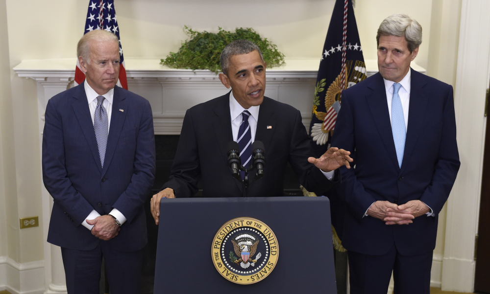 President Obama, flanked by Vice President Joe Biden and Secretary of State John Kerry, announces his rejection of the Keystone XL pipeline Friday at the White House because he does not believe it serves the national interest.