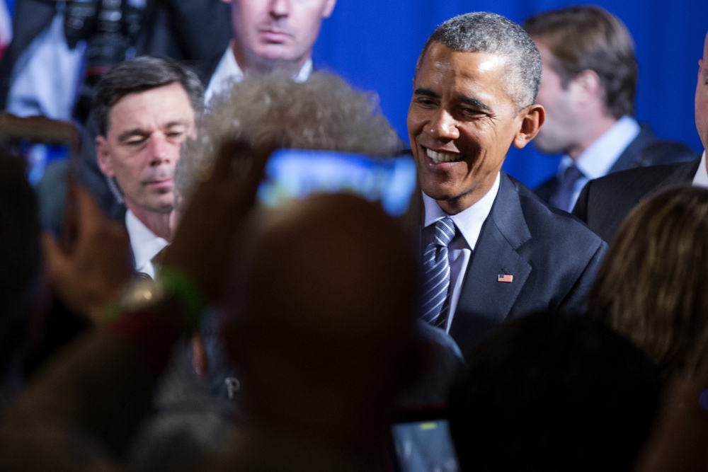 President Barack Obama shakes hands after speaking during a Organizing for Action event, on Monday, in Washington.