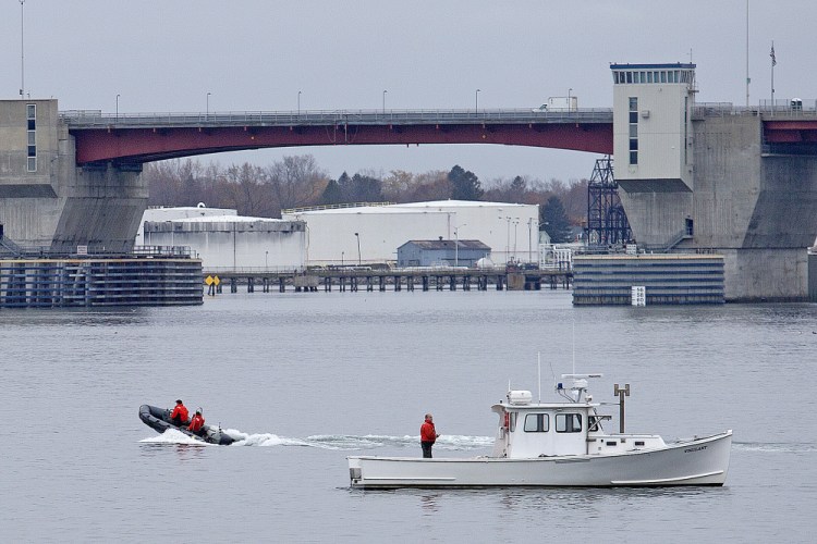 The Maine Marine Patrol boat Vigilant participates in the search for a missing water taxi and its operator, Adam Patterson, Thursday morning.