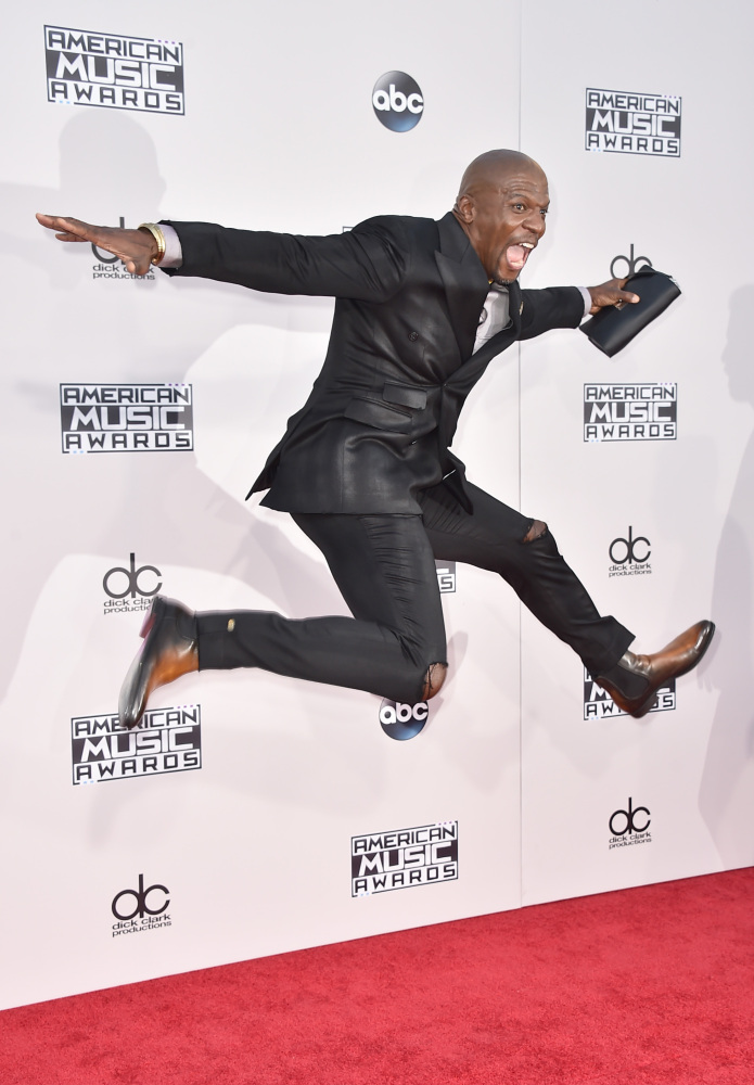 Terry Crews arrives at the American Music Awards in Los Angeles on Sunday.