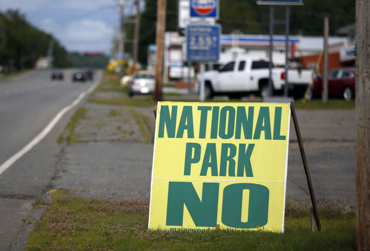 Opposition to a national park is seen on a sign on a road leading into Millinocket in August. Reaction to the national park proposal has been mixed.
The Associated Press