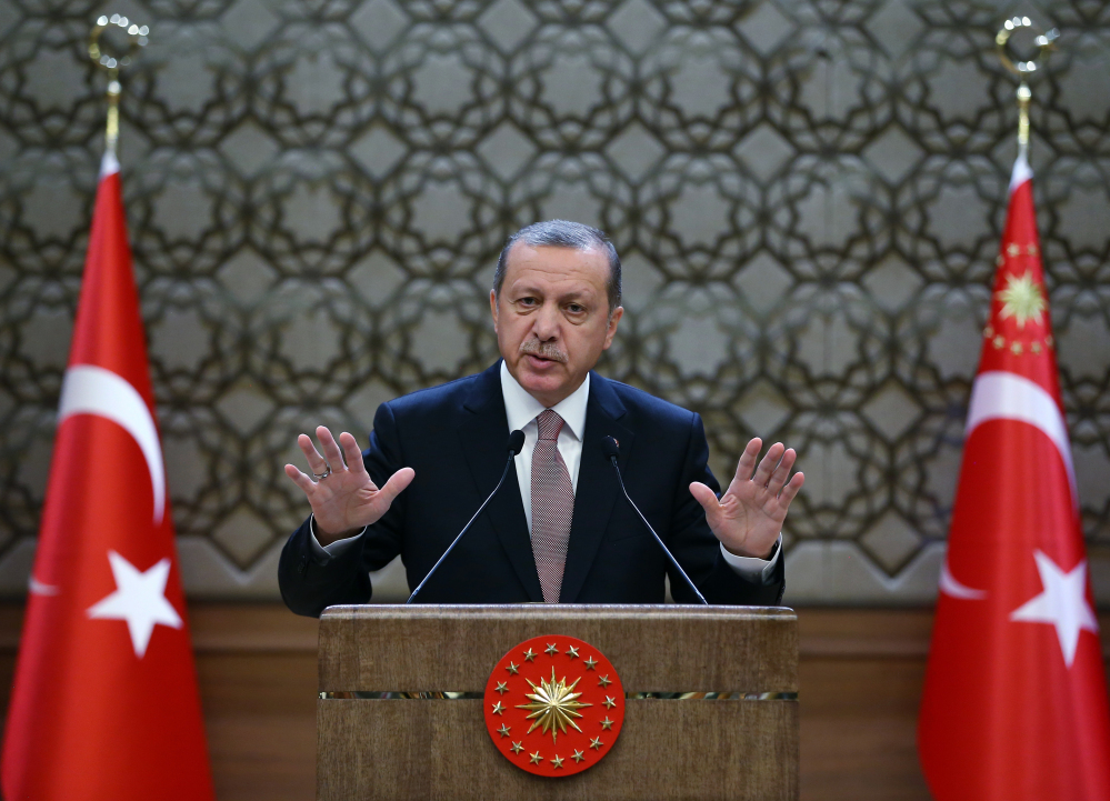 Turkish President Recep Tayyip Erdogan addresses local administrators at his palace in Ankara on Thursday. Turkey has released audio recordings of what it says are the Turkish military’s repeated warnings to the pilot of the Russian plane before it was shot down at the border with Syria.