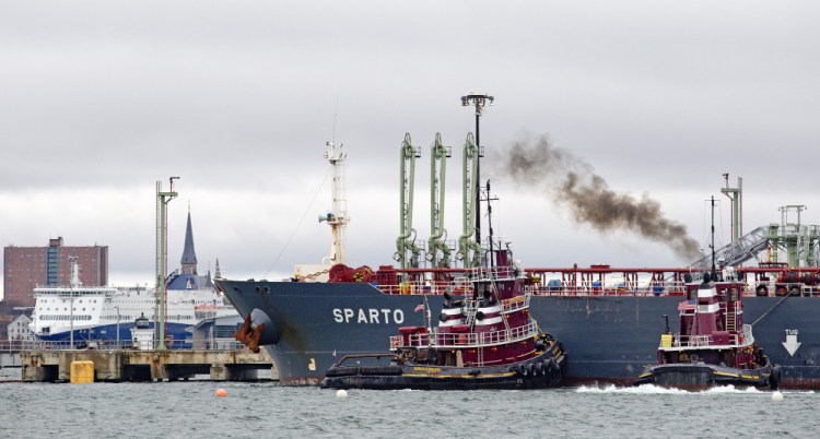 Tugboats guide the Cypriot tanker Sparto as it delivers more than 779,000 barrels of crude oil Saturday to Portland Pipe Line in South Portland, a scene that plays out only a couple of times a month now, officials say. “It’s a ghost town,” said Brian Fournier, president of Portland Tugboat.