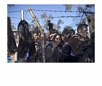 FILE - In this Nov. 4, 2015, file photo, people wait in line to enter the migrant and refugee registration camp in Moria, on the island of Lesbos, Greece. Some Republicans are pushing back against aggressive opposition in their party to Syrian refugees resettling in the U.S., fresh evidence of a rift within the GOP that threatens to complicate the party's outreach to minorities heading into the 2016 presidential contest.  (AP Photo/Marko Drobnjakovic, File)