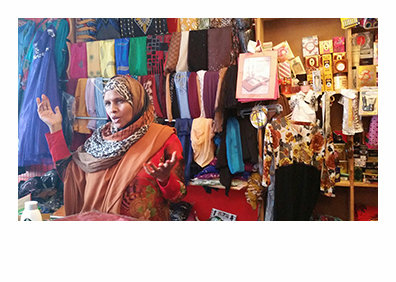 Safia Hersi owns the Almadina Variety Store on Lisbon Street in Lewiston.
(Photo by Susan Sharon, MPBN)