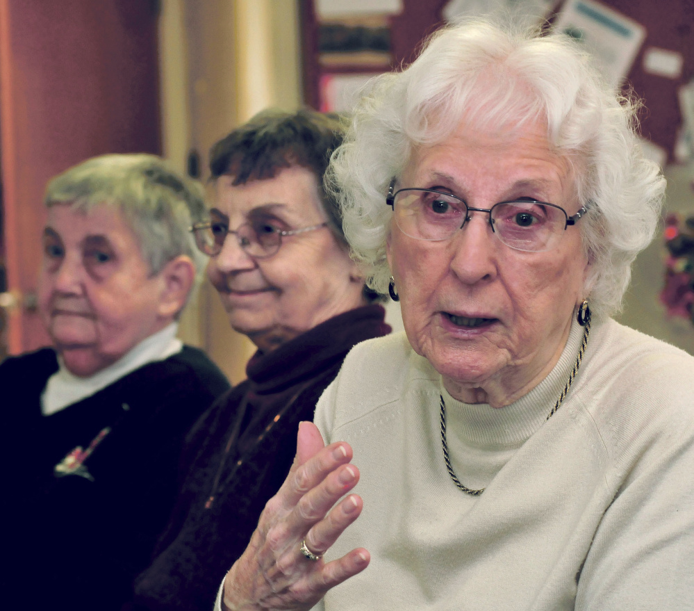 Spring House Gardens residents speak about possible foreclosure of the low-income senior apartment complex in Skowhegan on Tuesday. These three residents all said they like living in the centrally located residence. From left are Carol Dorian, Lorraine Hoskins and speaking is Frances Spaulding.