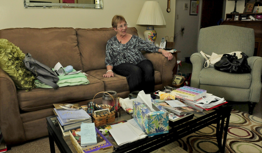 Spring House Gardens resident Marjorie Whipple relaxes in her apartment on Tuesday.  The 25 apartment complex is facing foreclosure.