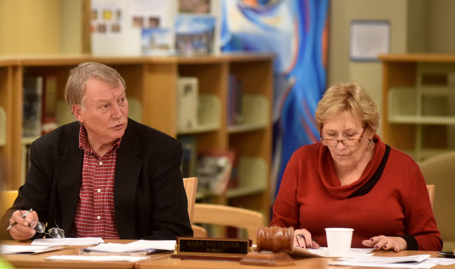 Superintendent Eric Haley, left, speaks at a Waterville Board of Education meeting conducted by Board Chairman Sara Sylvester at Waterville Senior High School on Wednesday night.