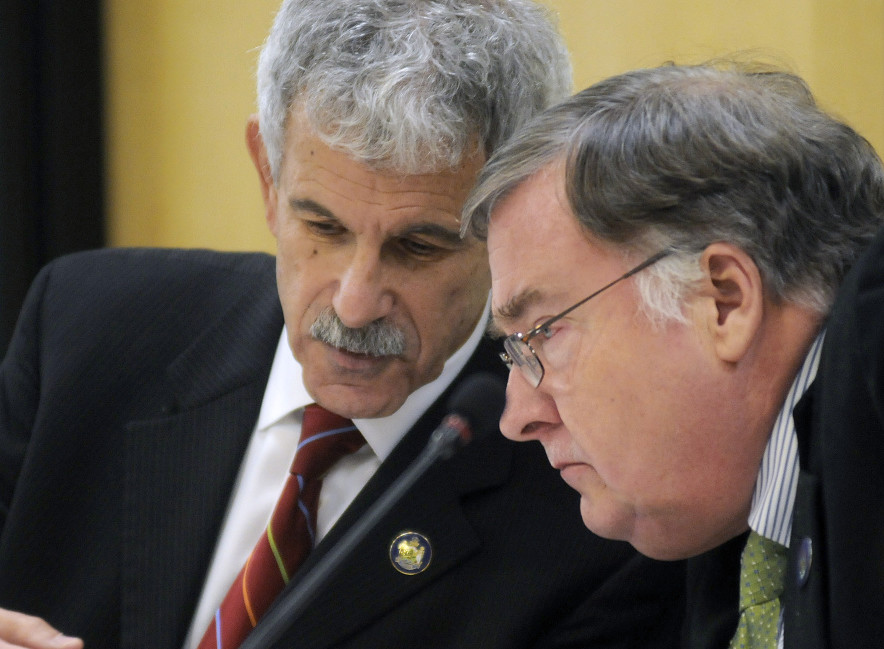 The Legislature's Government Oversight Committee chairs Sen. Roger Katz, R-Augusta, left, and Rep. Chuck Kruger, D-Thomaston, confer during a debate Thursday in Augusta about a probe conducted into the termination of Speaker Mark Eves at Good Will-Hinckley. 