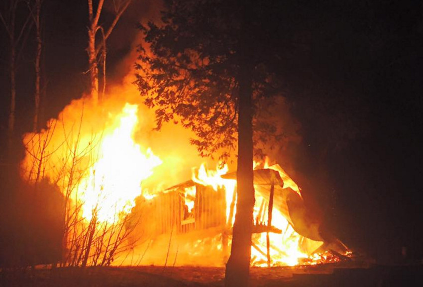 West Forks firefighters respond to a fire at a structure off Route 201 in The Forks early Friday morning.