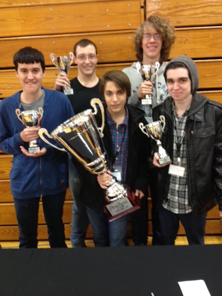 The Winslow High School team, The Big Boyzzzz, won the Thomas Cup, a technology competition that took place all night Friday into Saturday morning at Thomas College in Waterville. The team consists of, in the back row from left, Benjamin Lemieux, Josh Morissette and Jordan Maxell; and in the front row from left, Sylas Rayborn and Jacob Crosby