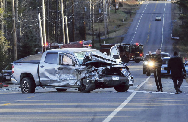 SIDNEY, ME-  DECEMBER 6: Police and firefighters investigate the scene of a fatal two- vehicle accident on Route 27 in Sidney on Sunday afternoon. This pickup truck and a vehicle that rolled over in a nearby ditch  were involved.  (Photo by David Leaming/Staff Photographer)