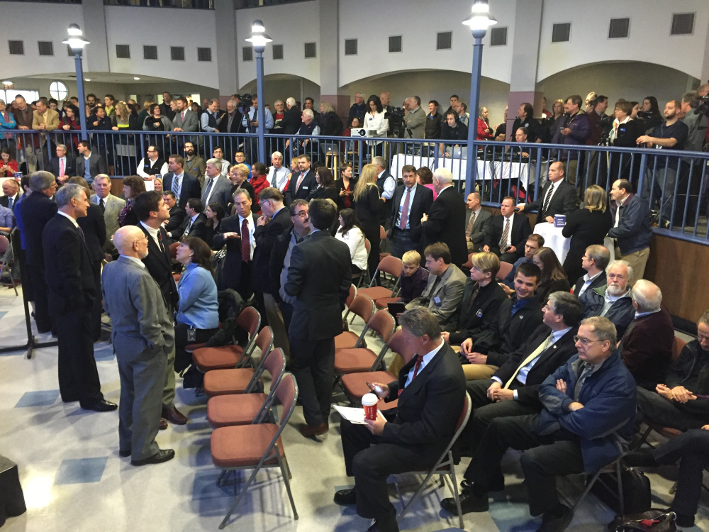 City and Colby College officials gather before a news conference Wednesday at the college announcing Collaborative Consulting will be locating a delivery center in Waterville that will bring up to 200 jobs to the city.