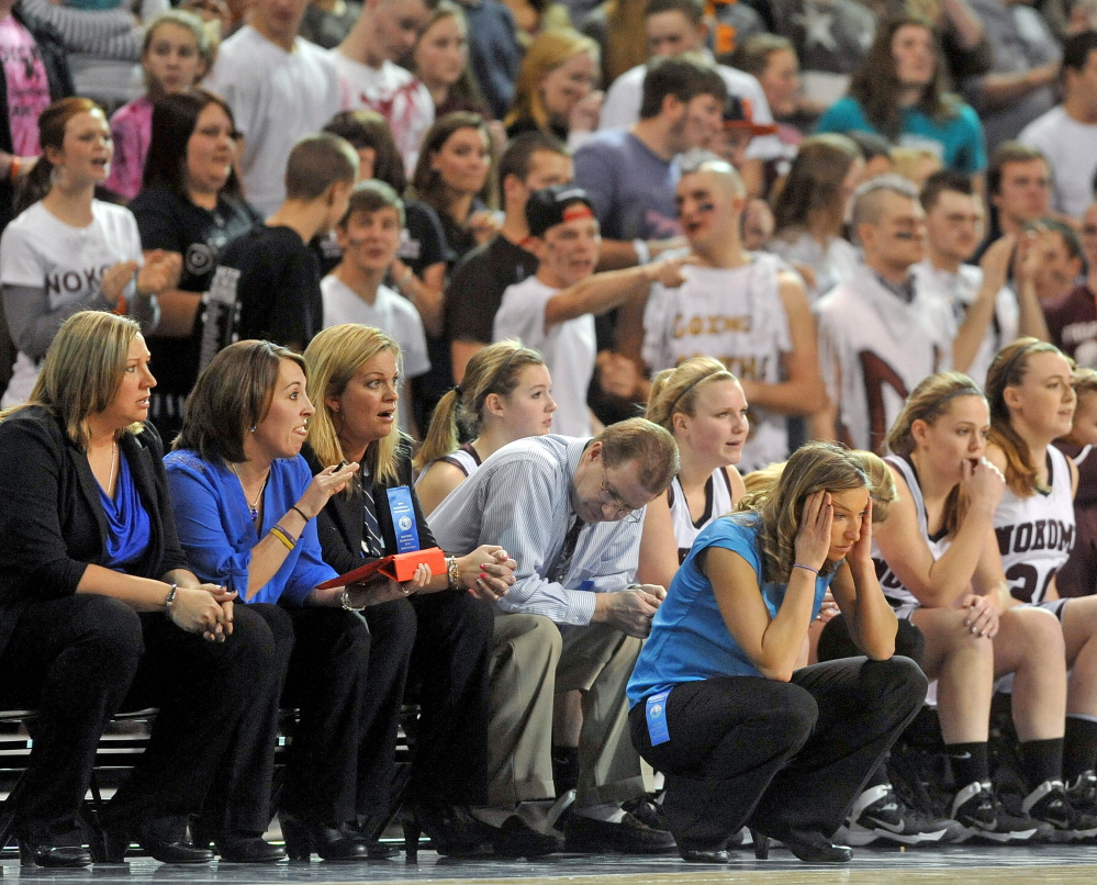 Nokomis coach Michelle Paradis reacts to a missed free throw late in the second half of a 2014 game against MDI. The Warriors picked up a big win against Mt. Blue in the season opener this season.