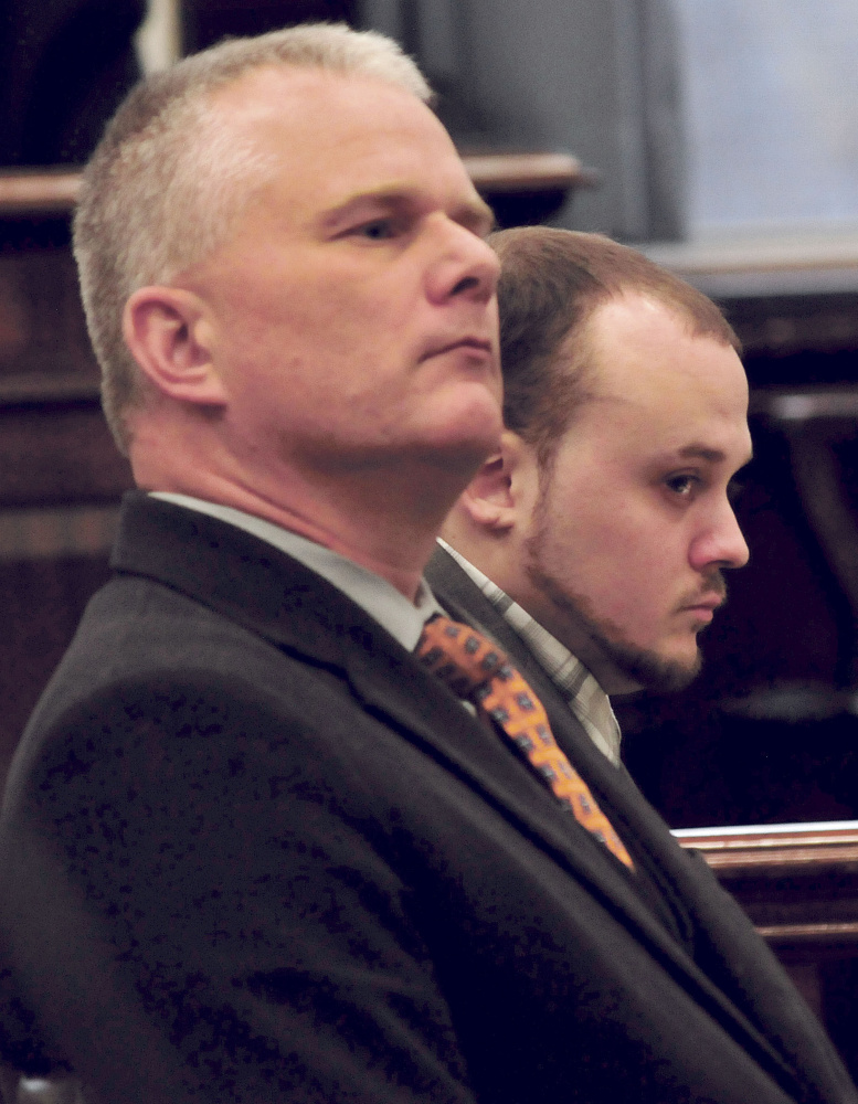 Defendant Jason Cote, right, listens to court proceedings with one of his attorneys Stephen Smith on Dec. 10 in Somerset County Superior Court in Skowhegan.
