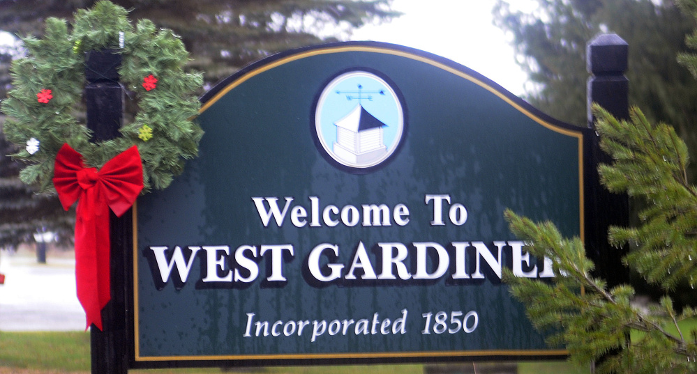 The welcome sign at the border with Gardiner is still standing, but town officials say three others have been stolen.