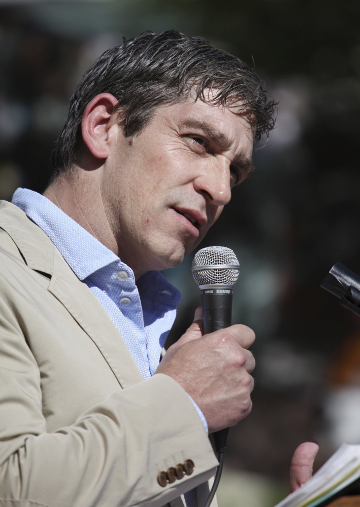 Inaugural poet Richard Blanco speaks in June 2014 at a World Refugee Day event in Congress Square Park in Portland.