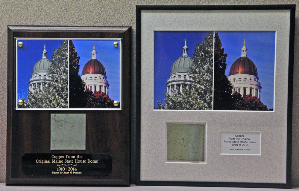 These plaques with a piece of old State House dome copper, along with before and after photos by Anne Dumont, are in the Office of The Executive Director of the Legislative Council.