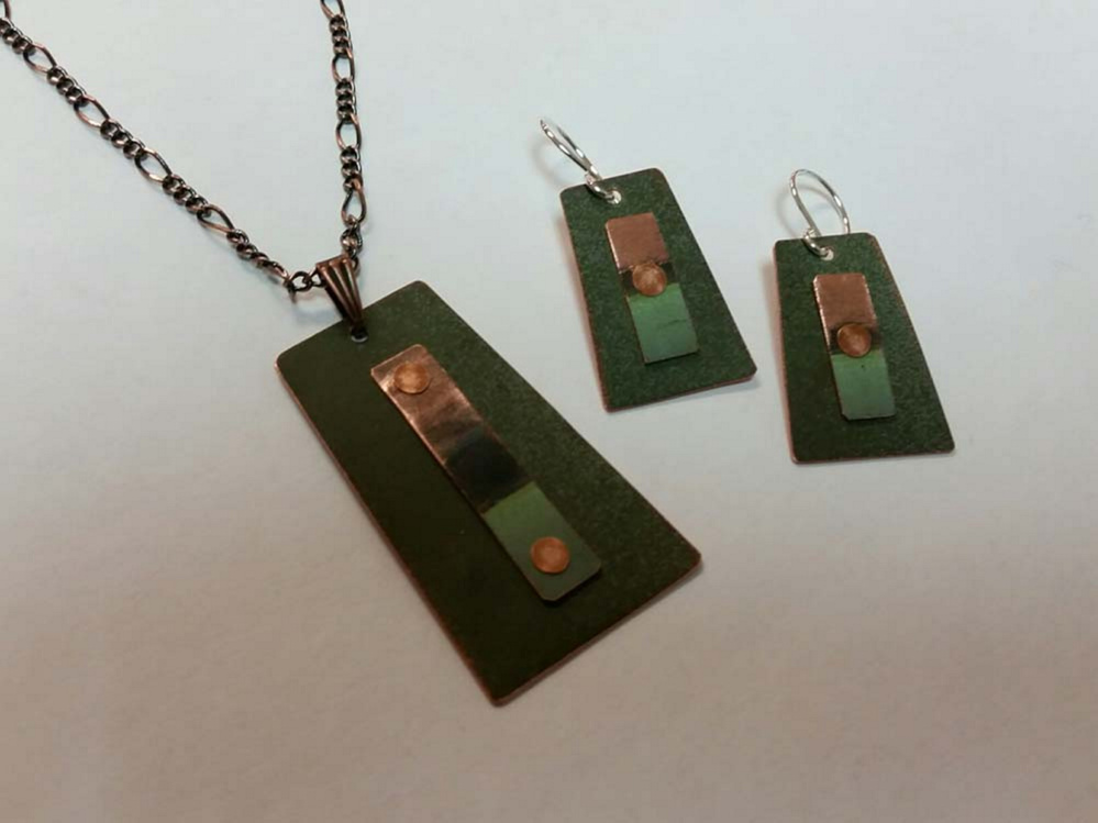 Bangor artist Roxanne Munksgaard is turning old copper from the State House dome into jewelry.
