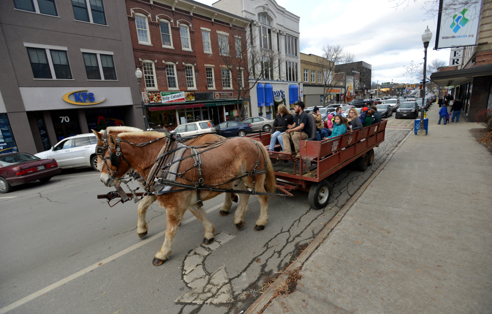 Free horse-drawn wagon rides were available Saturday on Main Street during the Downtown Waterville Open House.