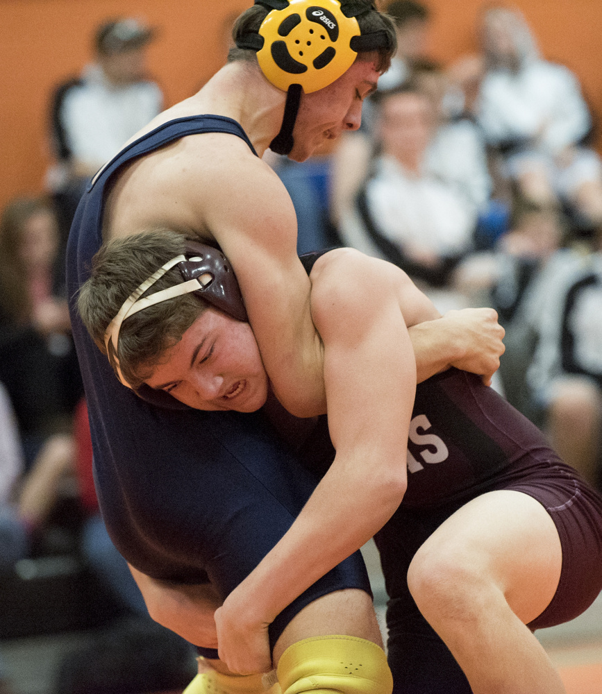 Nokomis’ Quinton Richards deals defeat to Morse’s Isaiah Cogswell in the 138-pound final round action in the Tiger Invitational on Saturday in Gardiner.