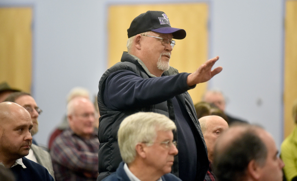 Bill Trafton states his concerns about traffic safety on Trafton Road during a public meeting Wednesday evening on the proposed construction of a full-service interchange at Interstate 95 and Trafton Road in Waterville. The meeting was hosted by the Maine Department of Transportation at the Spann Commons Summit Room at Thomas College in Waterville.