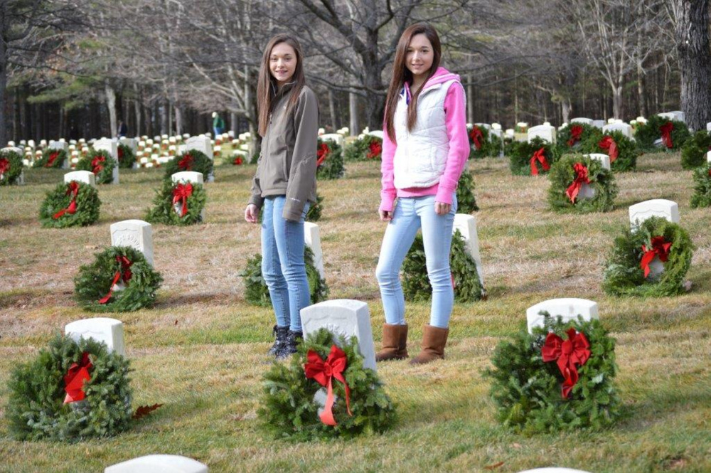 Tailah, left, and Hannah Mills, both of West Gardiner, volunteered in Wreaths Across America event at Togus VA in Augusta. Hannah is a junior at Gardiner High School and  Tailah is in 8th grade at Gardiner Middle school.  This was their first year volunteering to place the wreaths, on National Wreath Across America day honoring our past and present Veterans.