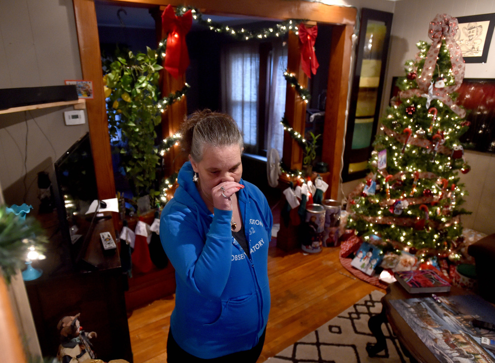 Carrie Harvey becomes emotional Thursday at her home in Waterville as she talks about her brother Michael Bowles, who needs a kidney transplant.