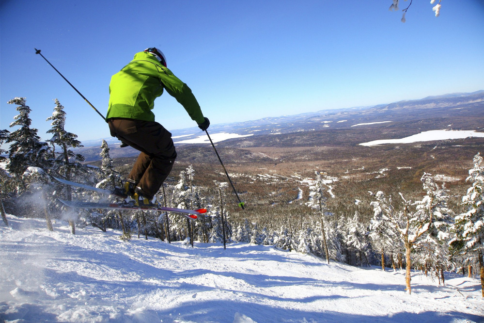 A skier shoots down Saddleback Mountain’s 44-acre glade , Casablanca, two years ago. The mountain, which was slated to possibly not open this year, may now open in January after a possible new owner stepped up.