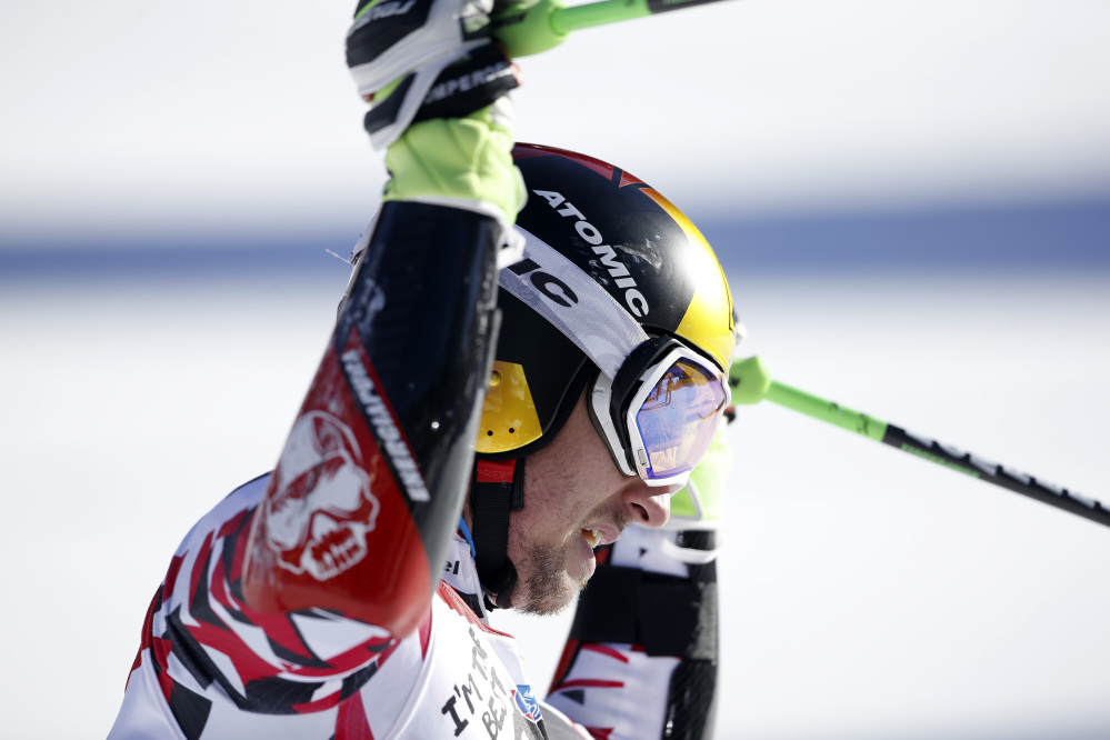Austria’s Marcel Hirscher celebrates in the finish area after winning the World Cup giant slalom Sunday in Alta Badia, Italy.