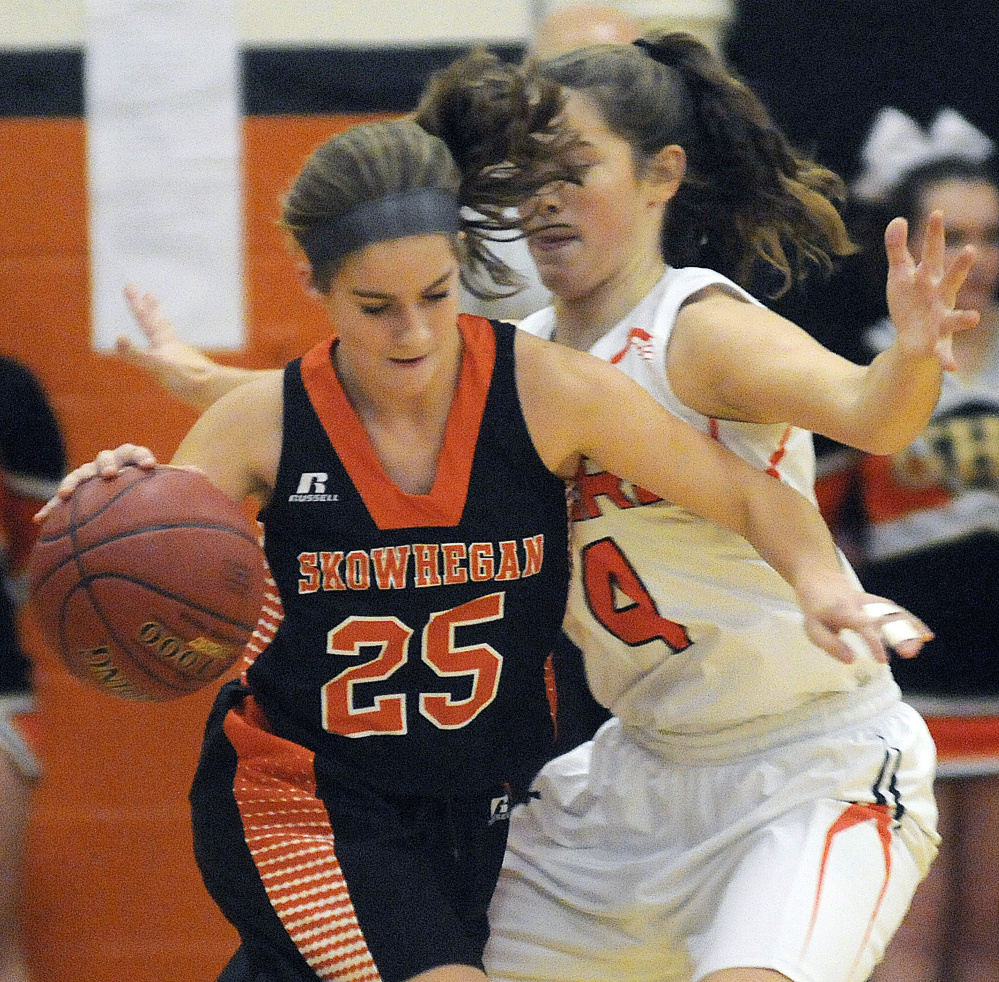 Gardiner Area High School’s Lauren Chadwick guards Skowhegan Area High School’s Sydney Ames during a game Tuesday in Gardiner.