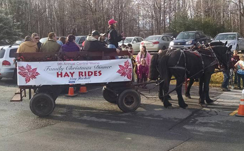 The hayride at the Central Maine Family Christmas Dinner, with driver Cathy Simmons, is shown Friday. The wagon was later hit by a car, killing one woman and injuring six.