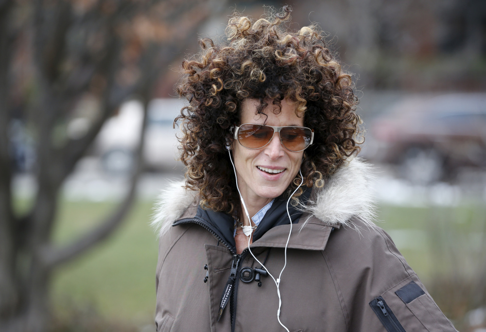 Andrea Constand, who accuses Bill Cosby of sexually assaulting her, walks in a park in Toronto on Wednesday. Cosby was charged Wednesday with sexually assaulting Constand at his home in 2004, in the first criminal case against the comedian accused of misconduct by dozens of women.